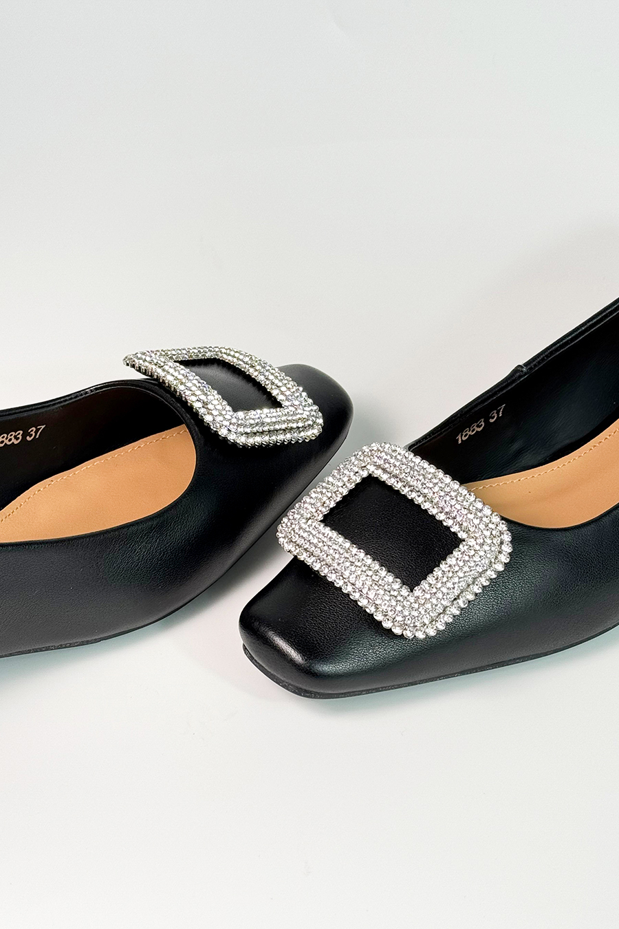 Glossy black leather flat