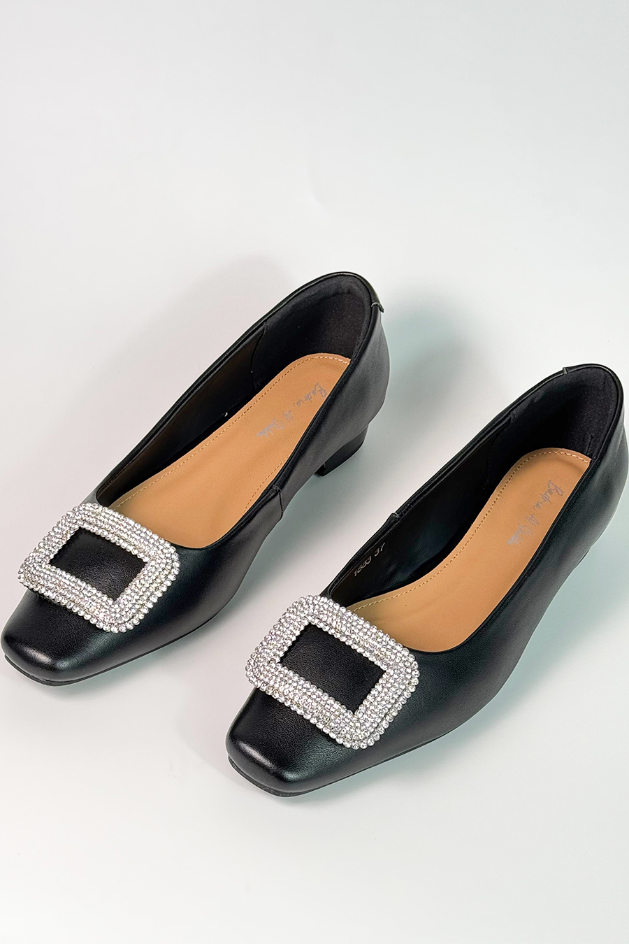 Glossy black leather flat