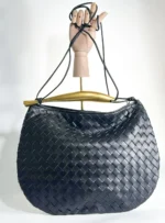 Luxury black handbag made of genuine leather